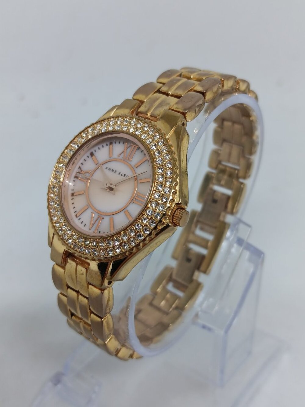 Anne Klein 10/9536 Women's 28mm MOP Dial Crystal Accent Rose Tone Quartz Watch